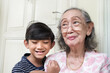 Healthy and happy Asian grandmother happy together with her grandson