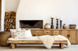 Wooden rustic bench near sideboard. Farmhouse interior design of modern living room, home.