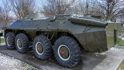 Wall Mural - An all-terrain combat wheeled vehicle for the transportation of personnel. A Soviet armored combat vehicle for transporting riflemen and fire support. Russian military equipment.