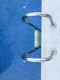 Fototapeta Tulipany - top view side view swimming pool ladder