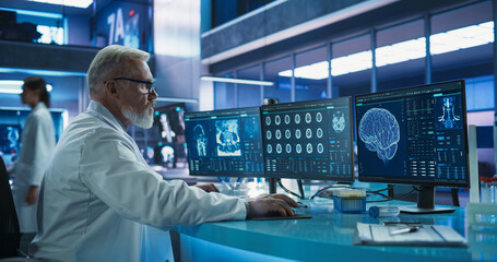 Aufkleber - Senior Male Neuroscientist Using Desktop Computer To Analyze MRI Scans Of Brain In Medical Research Center Laboratory. Caucasian Doctor Studying CT Scan Of Stroke Patient's Brain, Finding Solutions.