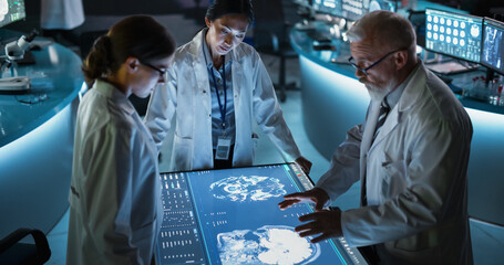 Aufkleber - Modern Hospital Medical Cancer Research Center: Diverse Scientists Gathered Around Interactive Touch Screen Table With CT Scans Of Brain On Display. Three Doctors Discussing Brain Tumor Treatment.