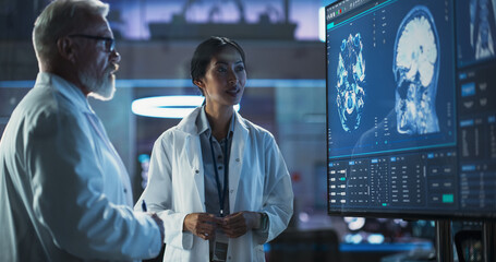 Poster - Neuroscience Laboratory Meeting: Female Asian Scientist And Male Caucasian Surgeon Discussing MRI Brain Scan On TV Display. Specialists Working On Medication For Rehabilitation After Brain Damage.