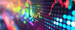Colorful blurry lights with stock market graph overlay.