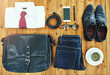 Business clothes, shoes and bag on table with phone, glasses or coffee cup for career opportunity. Fashion, style and jeans for creative job and startup tech company with shirt or glasses in top view