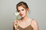 Fototapeta Niebo - Nice young woman on white background