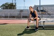 © Rawpixel.com - Athletic woman resing by the bench