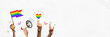 Banner. Contemporary art collage. Group of diverse hands holding rainbow flag and megaphone symbols of pride and social movement. Concept of human rights, freedom, love diversity celebration. Ad