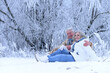 Portrait of beautiful elderly couple rejoice together in winter