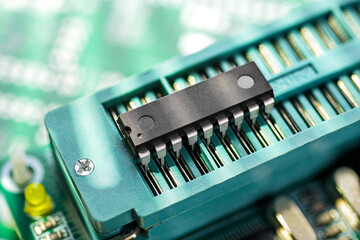 dip microcontroller in the zif socket of programming adapter. electronic software engineering.