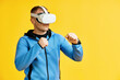 Man wearing virtual reality goggles doing shadow boxing