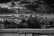 Creative view of the beautiful Prague Castle across the river. Night atmosphere dominant castle, monochrome postcard, background.