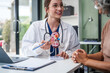© NanSan - Caucasian woman and elderly Asian woman discuss kidney model issues like gallstones, glomerulonephritis, acute/chronic kidney disease, infections, abnormal ureters, cysts, urinary system cancer.