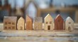 Abstract Houses. Neighbourhood of Tiny Wooden Toy Houses for Real Estate and Sustainable Housing