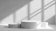 © Fay Melronna  - 3D rendering of a white podium with a spotlight on it