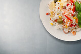Fototapeta Paryż - Plate Of Rice Salad On background