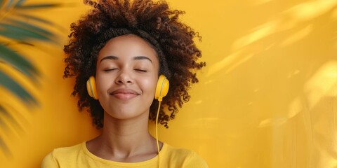 Smiling woman listening to music with headphones