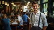 Portrait of a young man with suspenders standing in a restaurant
