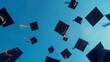 A collage of graduation caps thrown in the air against a blue sky, symbolizing the achievement and success of educational milestones