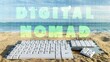 computer keyboard on a beach