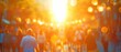 Sun glare image light blurring abstract background of a multitude of people on a sunny summer street