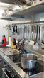 Safety Conscious Arrangement of Stainless Steel Kitchenware: An Illustration of Kitchen Safety Practices