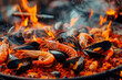 Traditional spanish seafood paella cooked on the fire outdoors