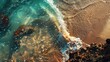 Aerial view of the waves breaking on the sandy beach. Natural background