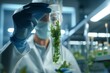 © LukaszDesign - Pharmaceutical, biotechnology, and botany research are the focus of science, test tube plant, and man. Pharmacy clinical trial, lab hand, or male scientist inspecting leaf chemical solution