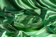 A 3d rendering of a green glass platform on a green silk cloth