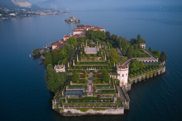 Wall Mural - Isola Bella and Stresa town aerial panoramic view. Panorama at sunrise on Lake Maggiore aerial view. Lake Maggiore, island, Isola Bella, Italy.