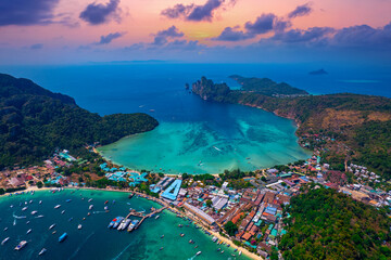 Wall Mural - Aerial view sunset Phi Phi island in Andaman Sea from drone in Province of Krabi, travel landmark of Thailand