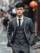 Professional Focus: Young Asian Man in Corporate Setting