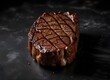 grilled beef steak on a dark background. expensive marbled beef of the highest grade fried to rare on the grill
