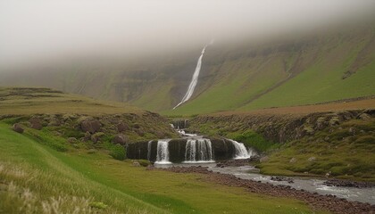 Wall Mural - creek and small waterfalls in foggy volcanic landscape iceland