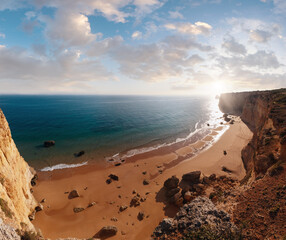 Wall Mural - summer evening atlantic rocky coast view with sandy beach praia da afurada (lagoa, algarve, portugal