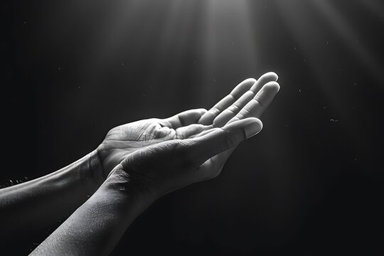 Hand prayer god faith holy worship on hope religion background of believe church pray jesus christian religious grace black white concept or love spiritual bible peace and spirit trust blessed light