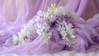   A table displays a bouquet of white and purple flowers atop a purple tablecloth Sheer curtains frame the background