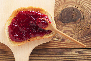 Wall Mural - Slice of toasted bread with jam