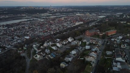 Wall Mural - Aerial cityscape with river at sunset during fall and residential Pittsburgh Pennsylvania