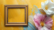 Artistic Composition: White and Pink Blossoms with Vintage Frame on a Golden Textured Canvas