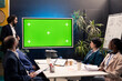 © DC Studio - Corporate team using greenscreen interactive board display in a workshop meeting, working to improve their skills and productivity. Business workers prepare for successful collaboration.