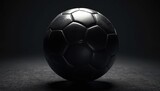 Fototapeta Sport - Black soccer ball in a dark room, concept design, background, poster, backdrop for sport and football, Euro 2024