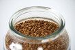 Close up view of freeze dried instant coffee in a glass jar