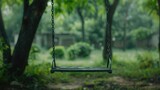 Fototapeta  - A serene scene of a child's empty swing, gently swaying in the breeze, evoking the absence of laughter and play on World Day Against Child Labor.