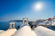 Famous Santorini island bell towers against Oia village. Greece