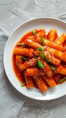 Canvas Print - Tteokbokki Korean traditional food spicy meal on white plate