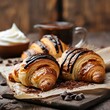 delicious croissants with chocolate on a plate 