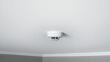 Fototapeta  - Smoke detector sensor on ceiling. Indicator of fire. House security system.