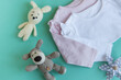Set of pink clothes and accessories for newborn baby.